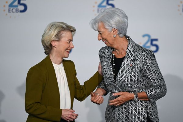 24 May 2023, Hesse, Frankfurt/Main: Christine Lagarde (r), President of the European Central Bank (ECB), greets EU Commission President Ursula von der Leyen at the ceremony marking the 25th anniversary of the European Central Bank. The ECB began operations on June 1, 1998. Photo: Arne Dedert/dpa